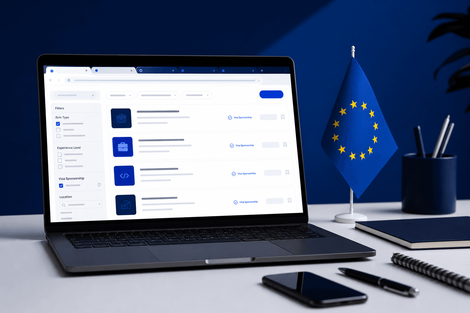 Laptop on a desk showing a filtered graduate job search interface with visa sponsorship indicators, EU flag in the background